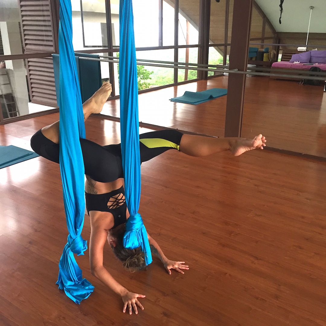 Aerial yoga in compression tights
